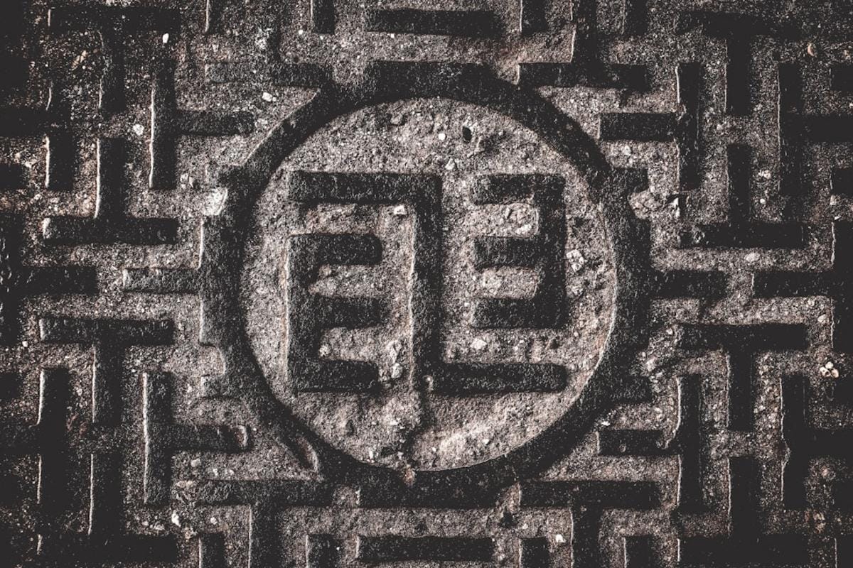 An evocative image of Göbeklitepe's ancient stone pillars arranged in circular enclosures, set against a sunset sky, highlighting its mysterious and monumental nature.