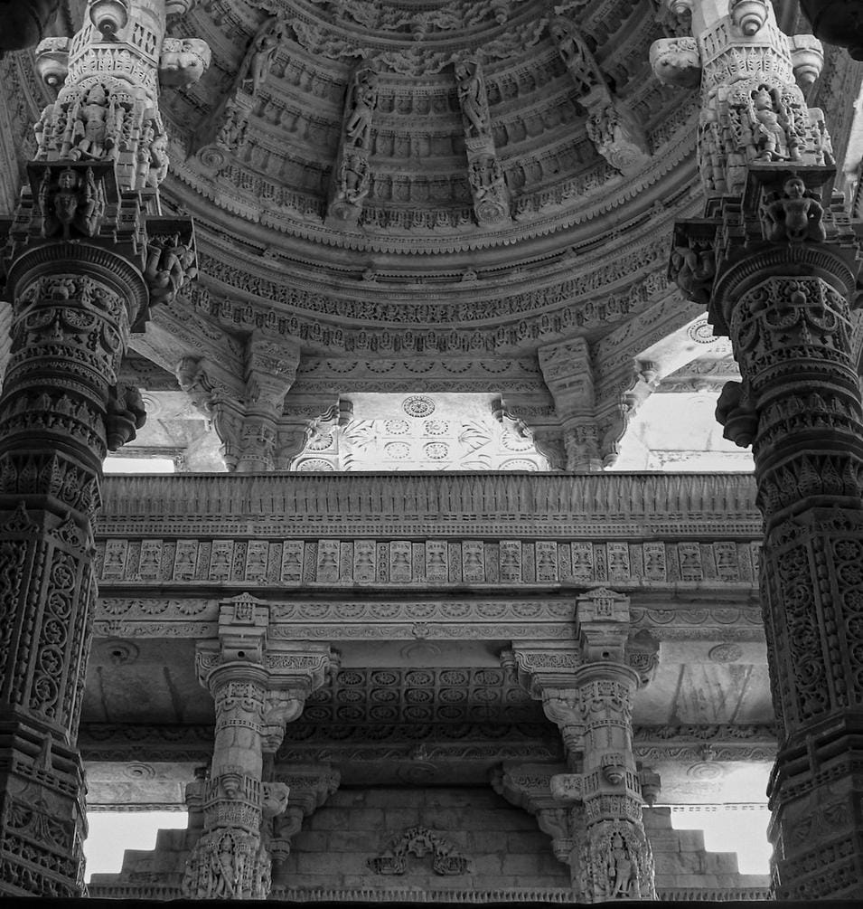 Gobeklitepe symbols Photograph of Gobeklitepe’s iconic carved pillars showing animal and symbolic motifs with archaeological tools for scale