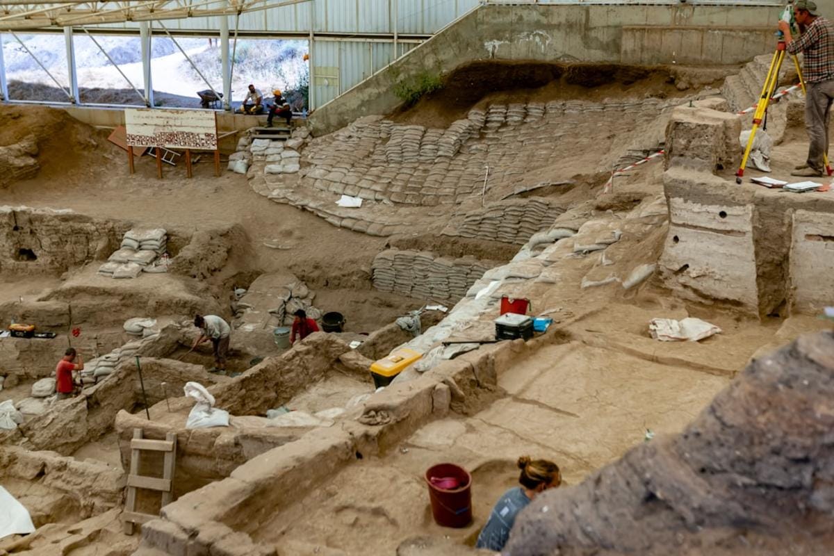 archived image of archaeologists excavating ancient stone pillars at Göbeklitepe